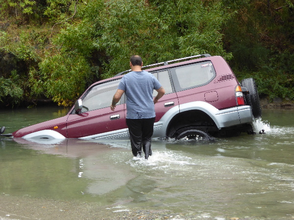 Car stuck in a river