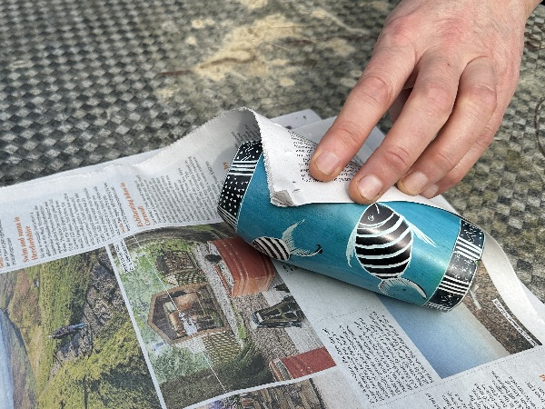 Wrapping in newspaper